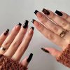 M15 Tortoiseshell Black French Tip Coffin Medium Nail